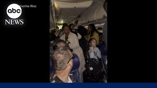 Southwest plane forced to evacuate after cell phone airplane seat catch fire [upl. by Aneeb]