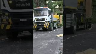 Construction team of construction vehicles on a small simulated construction site remote control mo [upl. by Yro]