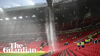 State of Old Traffords disrepair evident as water floods Manchester Uniteds stadium [upl. by Ynhoj116]