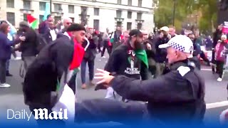 Furious protestors confront police making arrest at proPalestine march in London [upl. by Hotchkiss]