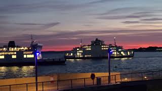 Two wightlink ferries crossing each other at sunset [upl. by Ilahtan]