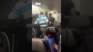 New video shows unruly passenger removed from Seattlebound flight [upl. by Grannia]