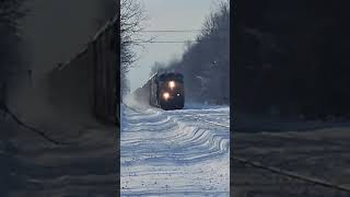 Autorack screams east on the Erie West Sub after epic snowfall Madison Ohio 12324 [upl. by Akimad]