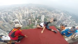 🙀 BASE JUMP GOES HORRIBLY WRONG Andy Lewis Takes a Dramatic 1200ft Plunge off KL Tower 🙀 [upl. by Camarata826]