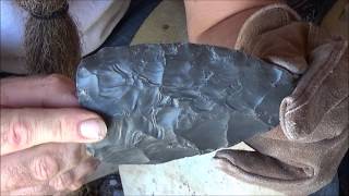 flintknapping a spearhead part 1 breaking rock [upl. by Nolana507]