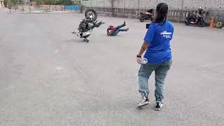 Guy Topples off Motorcycle While Trying to do Wheelie Without Front Wheel  1519468 [upl. by Rebak]