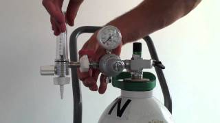 Fitting a Regulator amp Flowmeter to a Gas Cylinder  Demonstration [upl. by Obara]