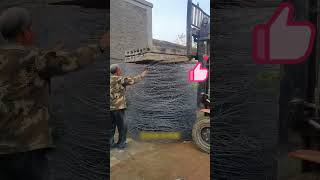 The process of compressing steel wire with the cement board on a forklift [upl. by Nadnal]