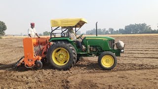 John Deere 5060e 60hp on 8ft rotery seeder [upl. by Soinski138]