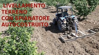 spianamento terreno nocciole con livellatore auto costruito e landini rex 100F [upl. by Lahcym]