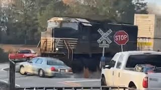 RAW VIDEO Freight train slams into car after stalling on tracks in Georgia [upl. by Aillicirp701]