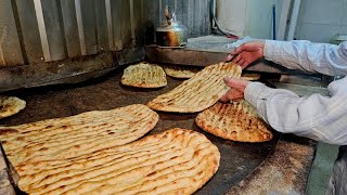 baking delicious barbari bread in iran  iranian bread recipe [upl. by Ayhtak888]