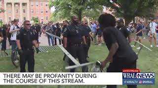 Officer slaps at protesters megaphone during UNCChapel Hill protest [upl. by Eatnahc]