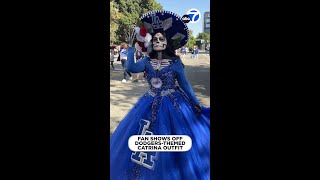 Fan dressed as Dodgersthemed La Calavera Catrina attends teams parade [upl. by Nonad36]