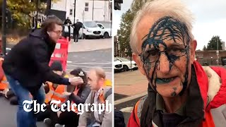 Insulate Britain protesters sprayed with ink as they block roads into London [upl. by Onaicram999]