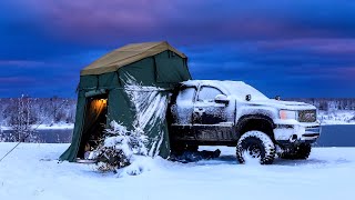 Camping In Snow Storm With Rooftop Tent And Diesel Heater [upl. by Nertie]