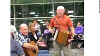 Newfoundlanders Turn Delayed Flight Into A Singalong [upl. by Ettelohcin]