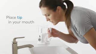 How to Use the Waterpik™ Nano Water Flosser WP310 [upl. by Ateuqahs650]