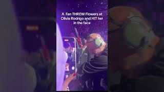 Olivia Rodrigo Gets Flower Bombed by Fan During GUTS Tour [upl. by Royall809]