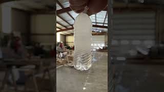 Slow motion instant freezing of a water bottle [upl. by Cavill510]