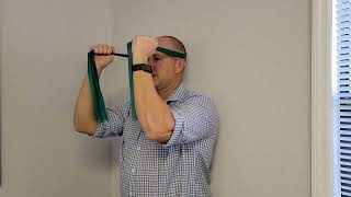 Standing Cervical Retraction Strengthening With Band  Pursuit Physical Therapy [upl. by Htabazile]