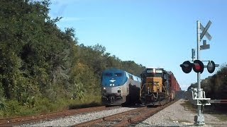 Amtrak Train Silver Star Passes CSX Train Making Pick Ups [upl. by Bigg283]