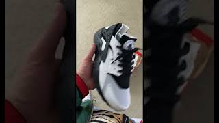 Unboxing the Nike WMNS Air Huarache White Black shorts shortsvideo youtubeshorts [upl. by Ellienad]