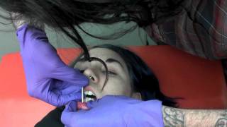 7 gauge needle stretched to 6 gauge labret freehand lip piercing on Pangeas counter girl [upl. by Iek925]