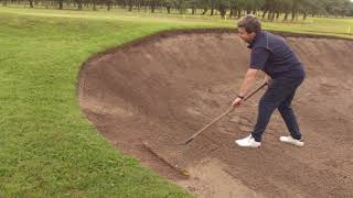 Bunker RakingHead Professional demonstrates how to rake bunkers ready for play [upl. by Ladonna]