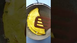 how to flip an omelet like a pro 🍳 shorts [upl. by Eatnohs]