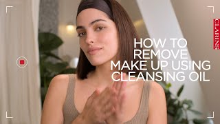 How to remove makeup using a cleansing oil  Clarins [upl. by Nirra754]