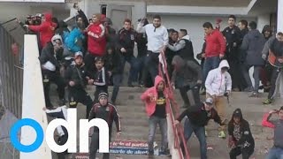 Football fans in Chile attack riot police [upl. by Aeiram759]