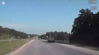 Bear makes mad dash across Misssouri highway crashes into pickup [upl. by Cirilla698]