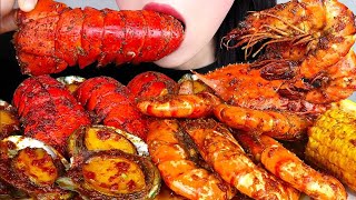 Asmr seafood boil mukbang lobster tail shirmp carb abalone sausage corn potatoes eattting sound [upl. by Elttil]