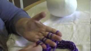 Finger Knitted Hat Tutorial Part 1 [upl. by Atteynot]