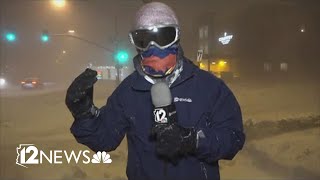 High winds whip around reporter as snow falls in Flagstaff [upl. by Ainsley]