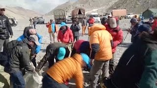 Volunteers Collect Rubbish at Mount Qomolangma Campsites [upl. by Huppert]