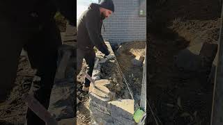 Completing a Blue Stone retaining wall canberra stonemason masonry landscaping [upl. by Elberfeld]