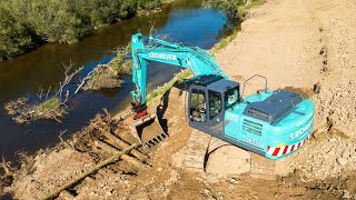 Kobelco SK21011 excavator rebuilds Scottish riverbank [upl. by Noled]