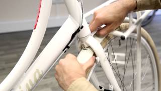 How to assemble a front rack on the Batavus Diva 7 Plus  Be Dutch Bicycles [upl. by Ginder]