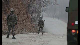 Two Koreas connect road across border to support excavation of soldier remains [upl. by Ester]