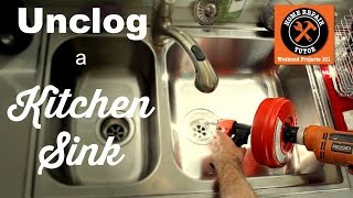 How to Unclog a Kitchen Sink Drain  by Home Repair Tutor [upl. by Nert]