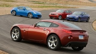 Nissan 370Z vs BMW 135i Mazda RX8 R3 and Pontiac Solstice GXP  CAR and DRIVER [upl. by Ruttger]