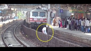 Stupid Man Challenging Mumbai Rajdhani Express by Jumping Into Fence at Dadar Western Railway [upl. by Eelime686]