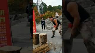 The process of splitting half dry wood with the iron ax [upl. by Relly382]