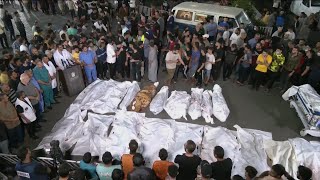 Bodies line up outside Gaza hospital as Israeli airstrikes continue [upl. by Idham]