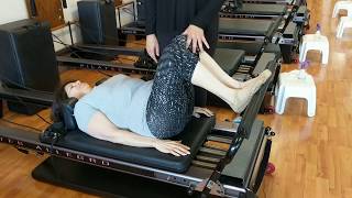 Stephanie Kronick working with Bonnie Freeman MS Patient on Pilates Footwork [upl. by Lehplar]