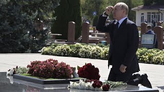 Russias Putin kneels down at memorial to victims of 2004 deadly Beslan siege [upl. by Gothard]