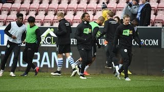 KICK IT OUT  Wigan Athletic players warm up for dedicated Kick It Out game [upl. by Nairam]