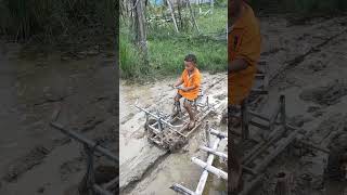 Kanika drives a recycled car stuck in the middle of Chenda water to help push the car [upl. by Einnej]